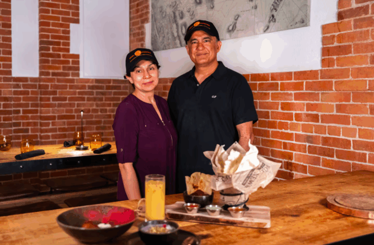 Meal Mantra Owners standing in front of table