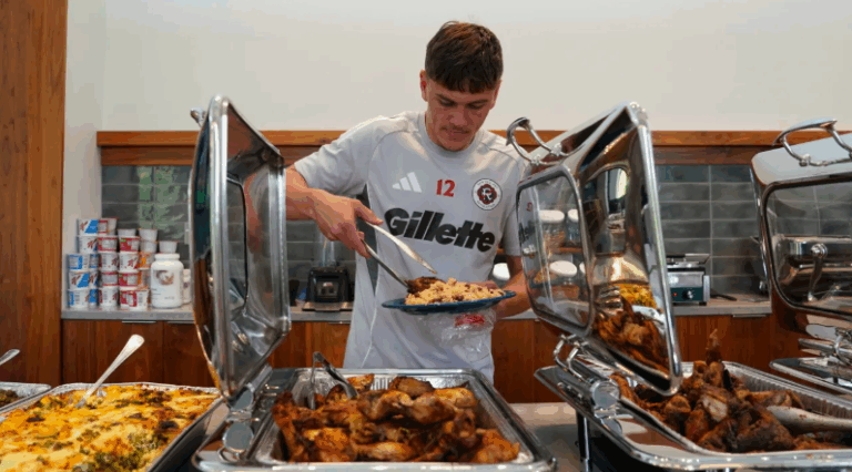 soccer_player_eating_Family_Affair_Catering