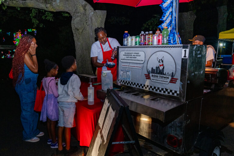 hotdog cart with kids in line